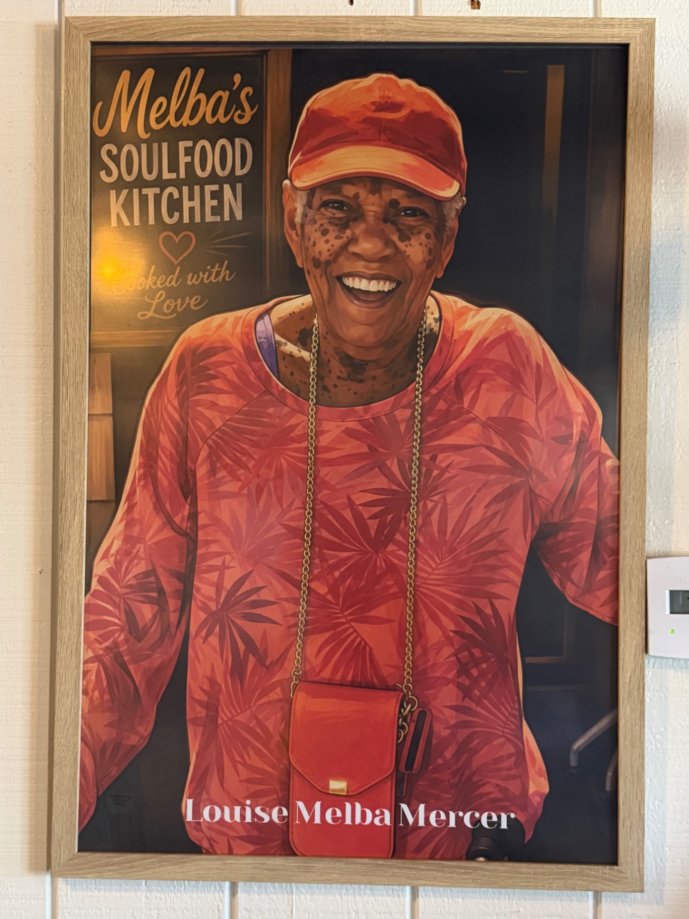 Framed portrait of Melba at the kitchen — cooked with love